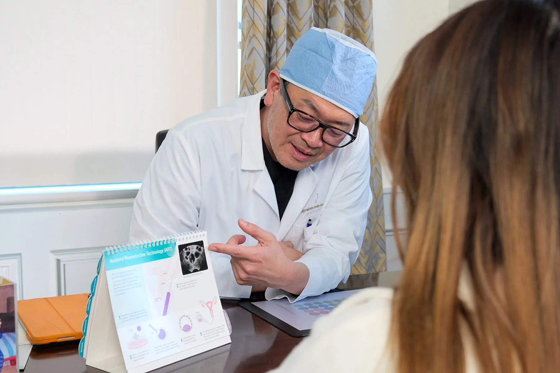 IRFC physician answering a patient’s questions during a consultation